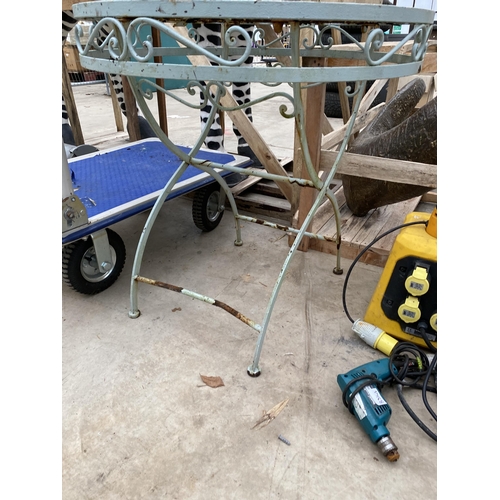 1758 - A METAL FOLDING BISTRO TABLE