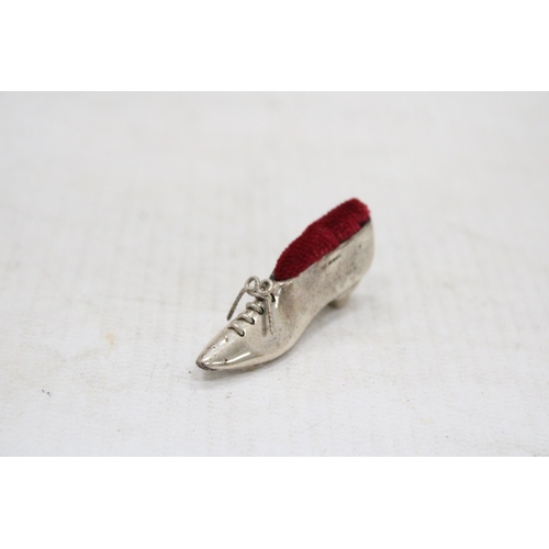 12 - A STERLING SILVER SHOE PIN CUSHION