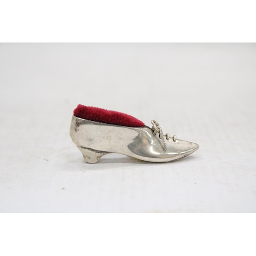 12 - A STERLING SILVER SHOE PIN CUSHION