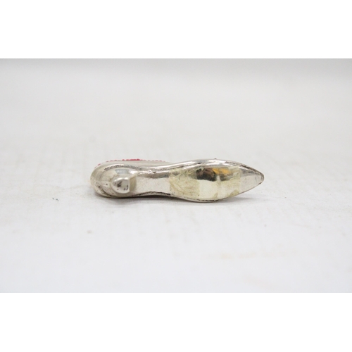 12 - A STERLING SILVER SHOE PIN CUSHION