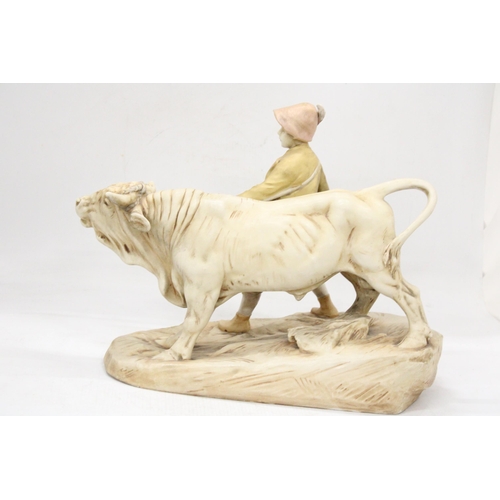 2 - AN EARLY 20TH CENTURY BISQUE PORCELAIN ROYAL DUX FIGURE OF A YOUNG MAN BESIDE A HARNESSED OX - PINK ... 