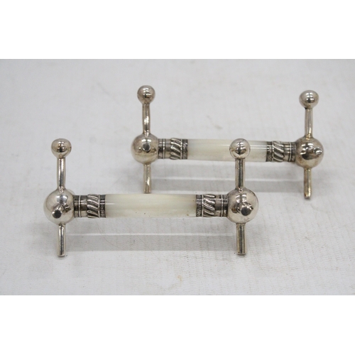 32 - TWO HALLMARKED SHEFFIELD SILVER AND MOTHER OF PEARL CUTLERY RESTS