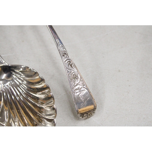 33 - THREE GEORGIAN SILVER ITEMS TO INCLUDE TWO DECORATIVE SERVING SPOONS AND A LADLE GROSS WEIGHT 181.8 ... 