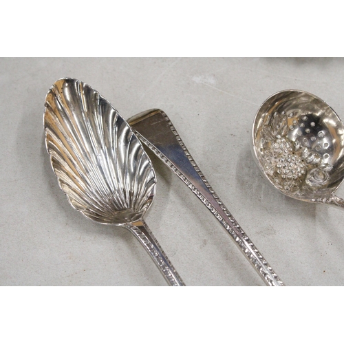 33 - THREE GEORGIAN SILVER ITEMS TO INCLUDE TWO DECORATIVE SERVING SPOONS AND A LADLE GROSS WEIGHT 181.8 ... 