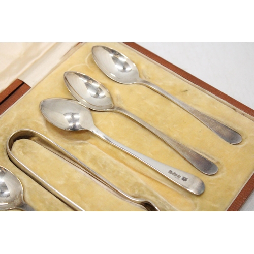 35 - A HALLMARKED SHEFFIELD SILVER SET OF SIX TEASPOONS AND SUGAR NIPS IN A LEATHER PRESENTATION CASE