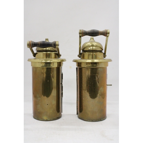 41 - A PAIR OF BRASS SHIPS LAMPS MARKED AFG 1942