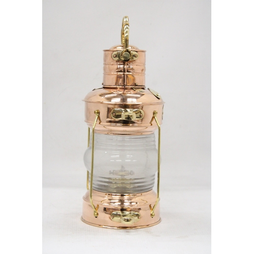 42 - A BRASS AND COPPER HANGING ANCHOR LANTERN LAMP