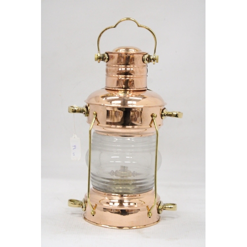 42 - A BRASS AND COPPER HANGING ANCHOR LANTERN LAMP