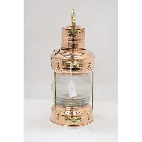 42 - A BRASS AND COPPER HANGING ANCHOR LANTERN LAMP