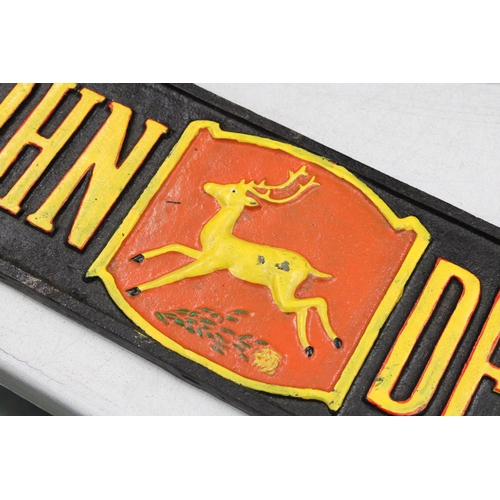 43 - A CAST JOHN DEERE SIGN 39CM X 12CM