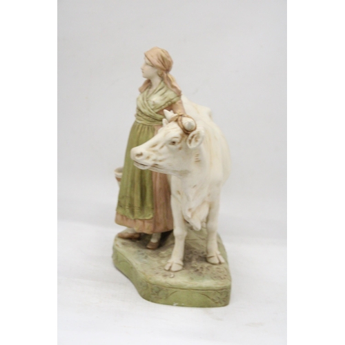 45 - A ROYAL DUX BISQUE PORCELAIN EARLY 20TH CENTURY FIGURE GROUP MODELLED AS A MILKMAID WITH COW