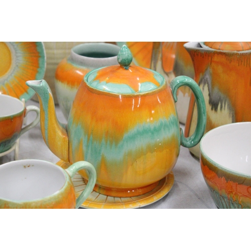 46 - A VINTAGE 1930'S SHELLEY HARMONY ORNAGE/GREEN DRIPWARE TO INCLUDE TEAPOT, TRIVET, HOT WATER POT, BUT... 