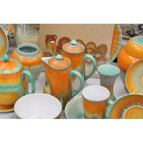 46 - A VINTAGE 1930'S SHELLEY HARMONY ORNAGE/GREEN DRIPWARE TO INCLUDE TEAPOT, TRIVET, HOT WATER POT, BUT... 