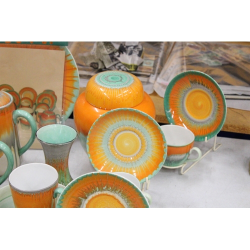 46 - A VINTAGE 1930'S SHELLEY HARMONY ORNAGE/GREEN DRIPWARE TO INCLUDE TEAPOT, TRIVET, HOT WATER POT, BUT... 