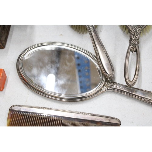 49 - FIVE MARKED STERLING SILVER ITEMS TO INCLUDE TWO BRUSHES, TWO MIRRORS AND AN EDGED COMB