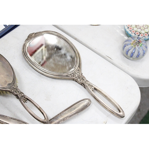 49 - FIVE MARKED STERLING SILVER ITEMS TO INCLUDE TWO BRUSHES, TWO MIRRORS AND AN EDGED COMB