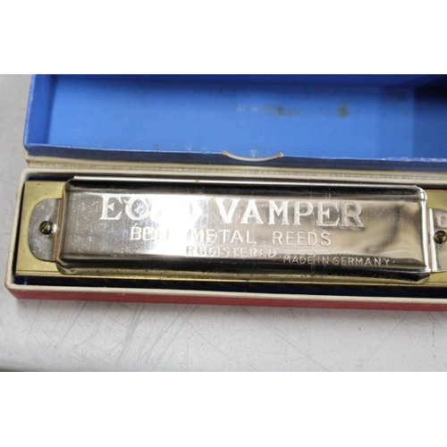 51 - FOUR BOXED HARMONICAS TO INCLUDE THE CHROMONICA, THE ECHO VAMPER, THE ECHO AND THE EDUCATOR 1