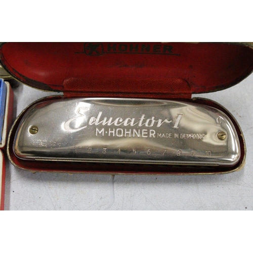 51 - FOUR BOXED HARMONICAS TO INCLUDE THE CHROMONICA, THE ECHO VAMPER, THE ECHO AND THE EDUCATOR 1