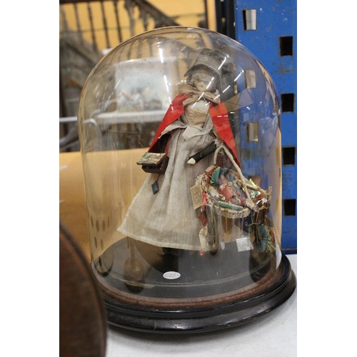 53 - A VICTORIAN HAND BLOWN GLASS DOME WITH A FIGURE OF A WELSH STREET SELLER ON A WOODEN BASE