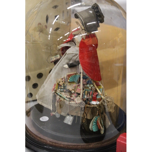 53 - A VICTORIAN HAND BLOWN GLASS DOME WITH A FIGURE OF A WELSH STREET SELLER ON A WOODEN BASE