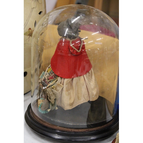 53 - A VICTORIAN HAND BLOWN GLASS DOME WITH A FIGURE OF A WELSH STREET SELLER ON A WOODEN BASE