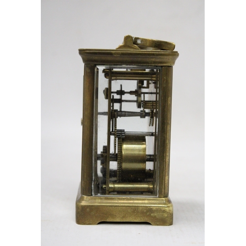 57 - A HOLBOURN LONDON CARRIAGE CLOCK WITH VISUAL ESCAPEMENT WITH KEY