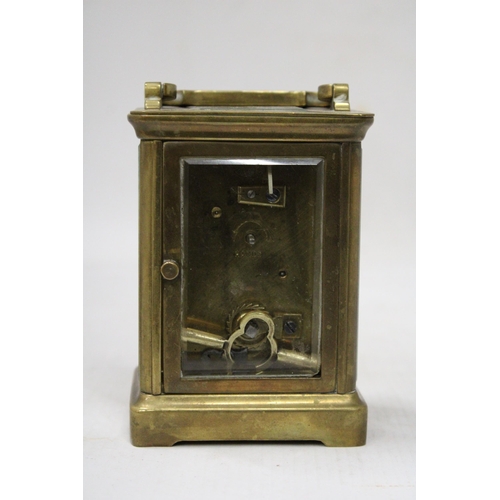 57 - A HOLBOURN LONDON CARRIAGE CLOCK WITH VISUAL ESCAPEMENT WITH KEY