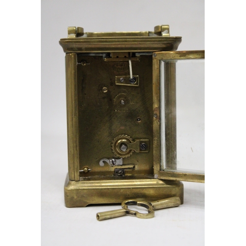 57 - A HOLBOURN LONDON CARRIAGE CLOCK WITH VISUAL ESCAPEMENT WITH KEY