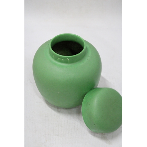 58 - A GREEN RUSKIN GINGER JAR AND COVER HEIGHT 17CM