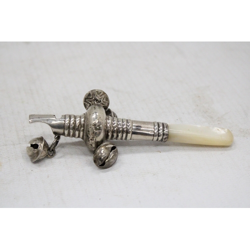 6 - A VICTORIAN SILVER BABY'S RATTLE WITH WHISTLE AND FOUR BELLS AND MOTHER OF PEARL HANDLE BELIEVED TO ... 