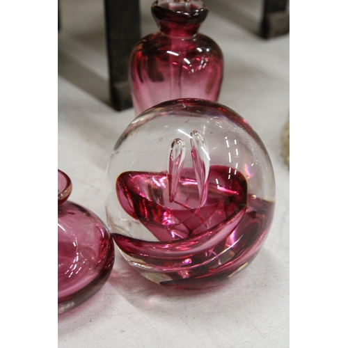 63 - THREE SIGNED AMANDA HAZELWOOD CRANBERRY ART GLASS TO INCLUDE TWO SCENT BOTTLES WITH STOPPERS AND A P... 