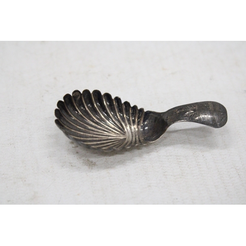 7 - A GEORGIAN SILVER TEA CADDY SPOON TOGETHER WITH A SILVER PLATED EXAMPLE