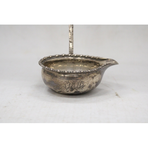 8 - AN EARLY 19TH CENTURY HALLMARKED SILVER PUNCH LADLE