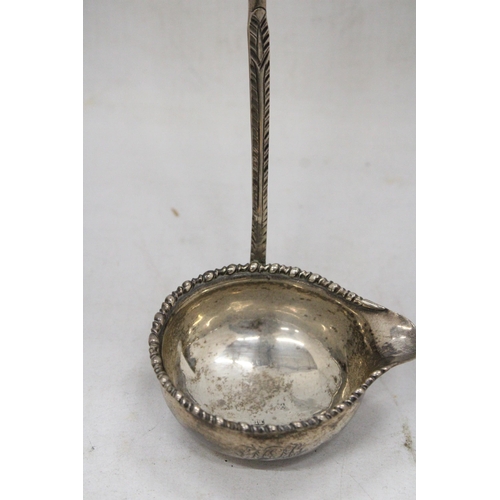 8 - AN EARLY 19TH CENTURY HALLMARKED SILVER PUNCH LADLE