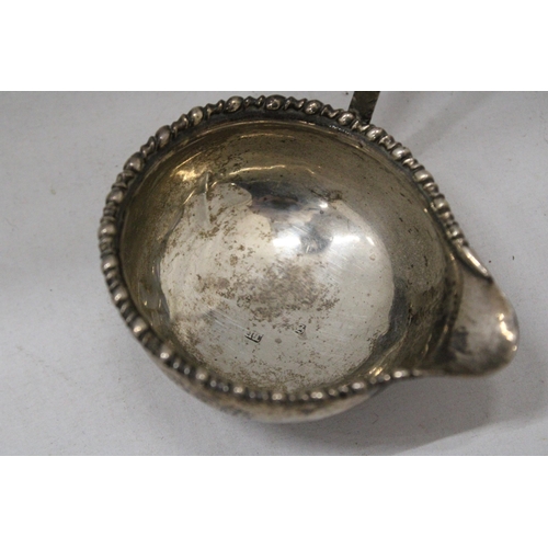 8 - AN EARLY 19TH CENTURY HALLMARKED SILVER PUNCH LADLE