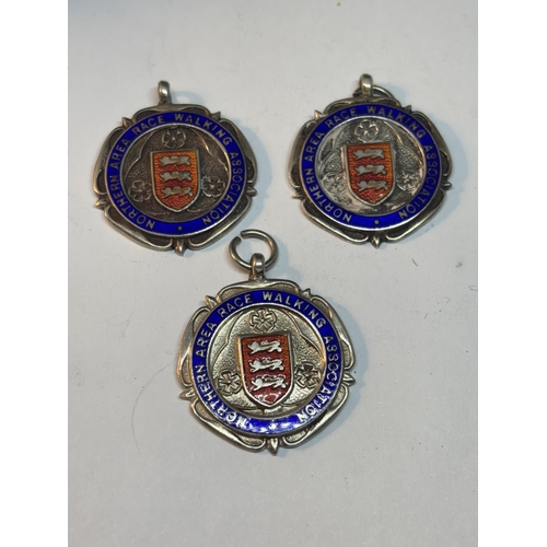 761 - THREE HALLMARKED BIRMINGHAM SILVER AND ENAMEL MEDALS NORTHERN AREA WALKING ASSOCIATION