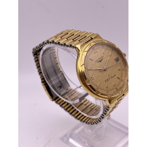 500 - A GOLD PLATED VINTAGE LONGINES CONQUEST VHP QAURTZ WRIST WATCH WITH ORIGINAL BRACELET