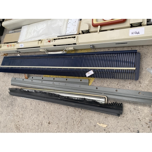 2371 - AN IMPERIAL KNITMASTER KNITTING MACHINE AND ACCESSORIES