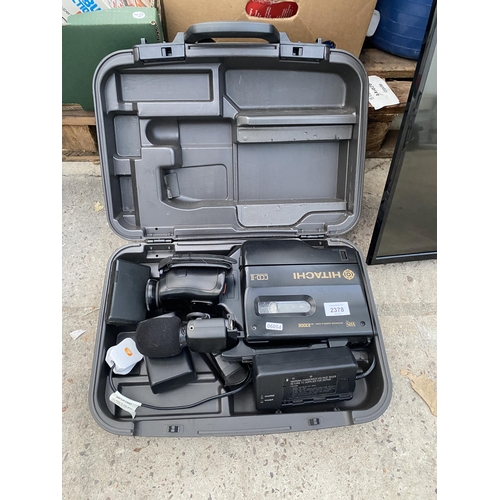 2378 - AN HITACHI VHS CAMCORDER WITH CARRY CASE