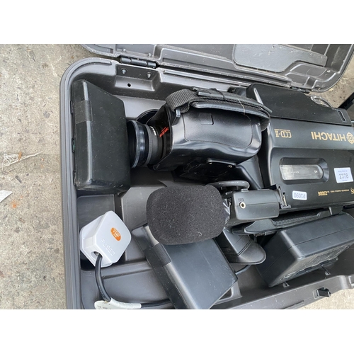 2378 - AN HITACHI VHS CAMCORDER WITH CARRY CASE