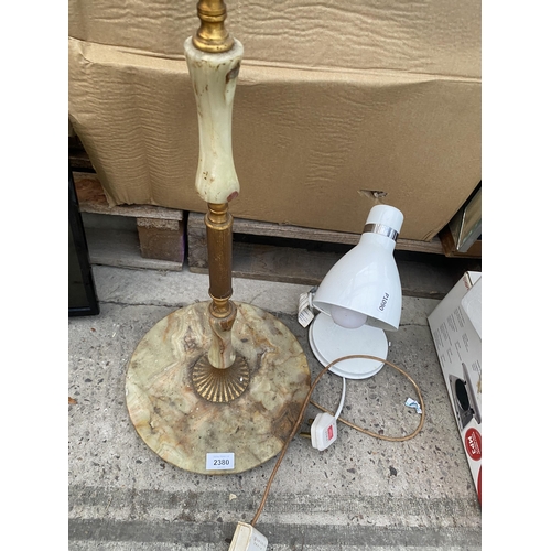 2380 - AN ONYX AND BRASS STANDARD LAMP AND A SMALL TABLE LAMP