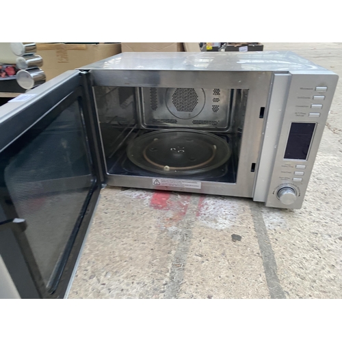 2388 - A LARGE SILVER KENWOOD MICROWAVE OVEN