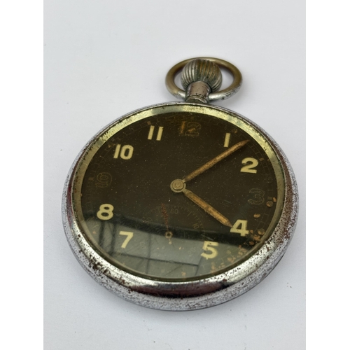 563 - A VINTAGE BLACK FACED MILITARY POCKET WATCH MARKED BRAVINGTONS G.S.T.P XX 11330