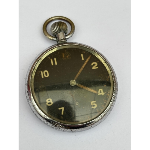 563 - A VINTAGE BLACK FACED MILITARY POCKET WATCH MARKED BRAVINGTONS G.S.T.P XX 11330