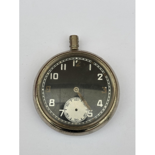 564 - A VINTAGE BLACK FACED MILITARY POCKET WATCH MARKED G.S.T.P L 4521