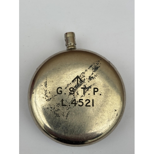 564 - A VINTAGE BLACK FACED MILITARY POCKET WATCH MARKED G.S.T.P L 4521