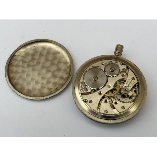 564 - A VINTAGE BLACK FACED MILITARY POCKET WATCH MARKED G.S.T.P L 4521