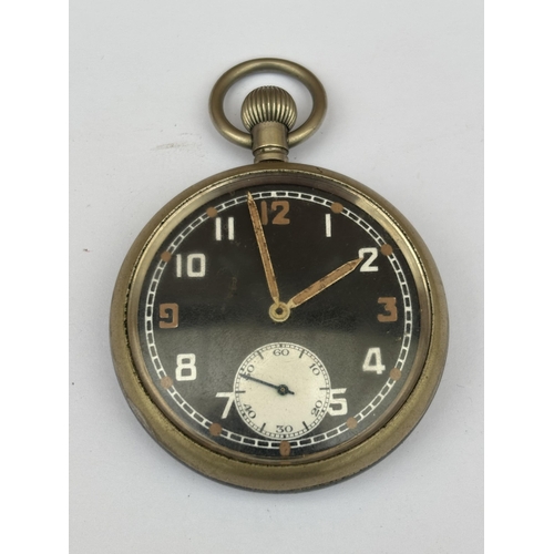 565 - A VINTAGE BLACK FACED MILITARY POCKET WATCH MARKED G.S.T.P L 4525