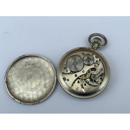 565 - A VINTAGE BLACK FACED MILITARY POCKET WATCH MARKED G.S.T.P L 4525