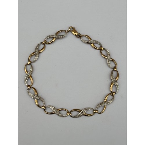 568 - A HALLMARKED 9CT WHITE AND YELLOW GOLD DIAMOND BRACELET, LENGTH 19 CM, WEIGHT 3.6 G